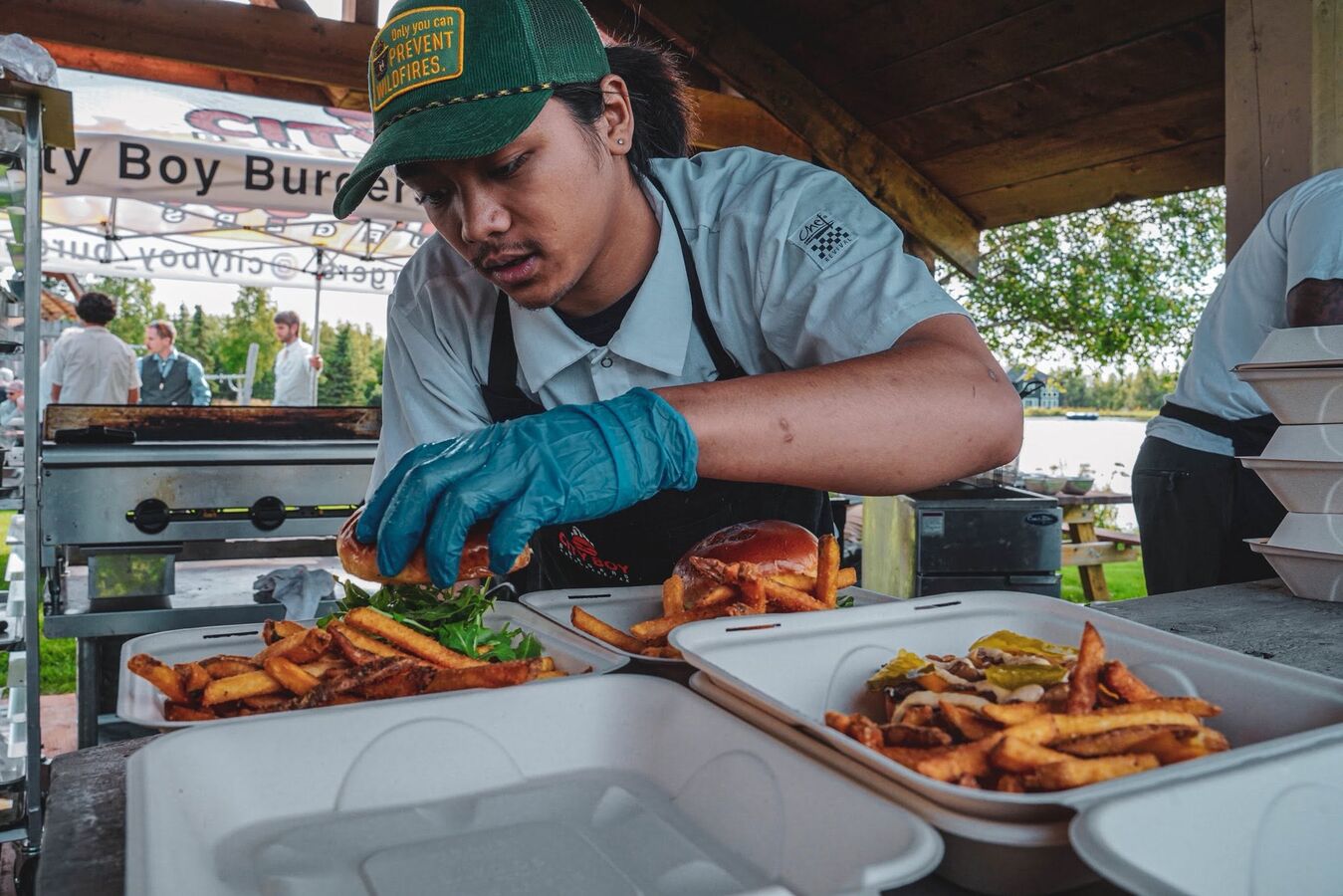 Plating burgers at the Sunday market